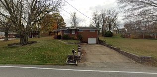 Home exterior representing a property lead being priced by type and source